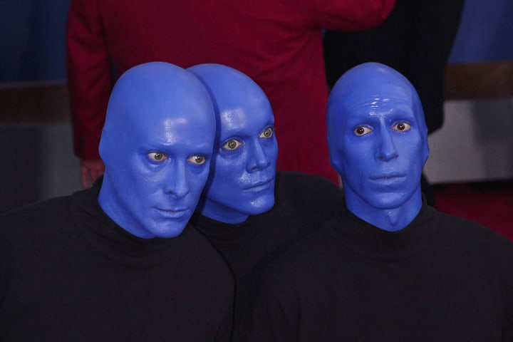 Blue Man Group is pictured