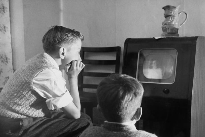 Children are pictured watching television