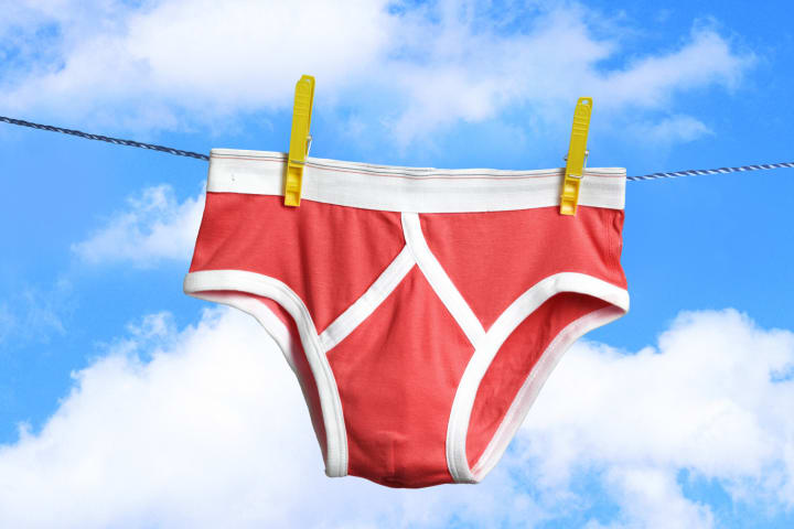 Red underwear on a clothesline.