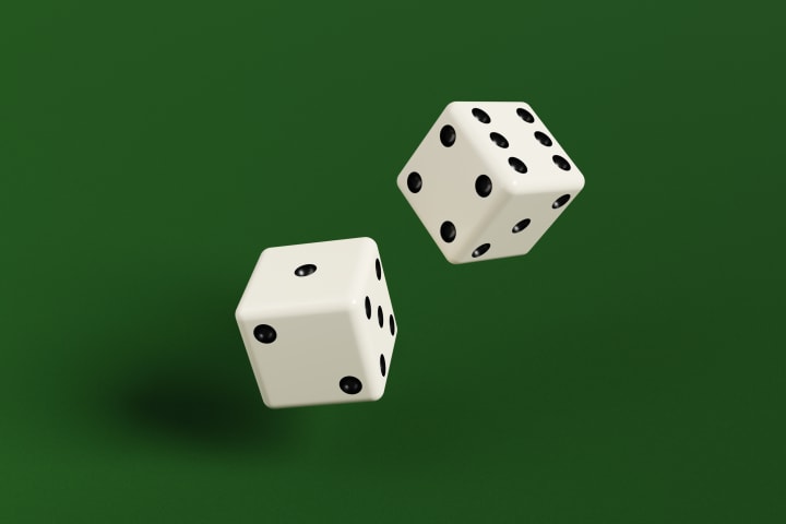 rolling dice on a green background